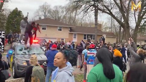 WATCH: BLM Protest Gets Out of Control as Protestors Jump on, Try to Destroy Police Cars