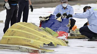 Indonesian Divers Find Black Boxes, Human Remains In Plane Wreckage