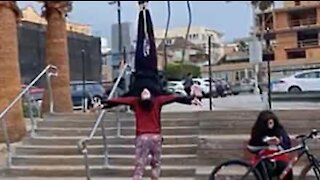 These acrobats have some serious balancing skills