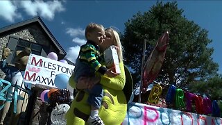 Birthday parade held for special Denver toddlers