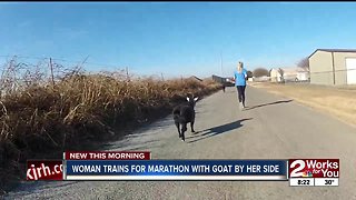 Woman trains for marathon with goat by her side