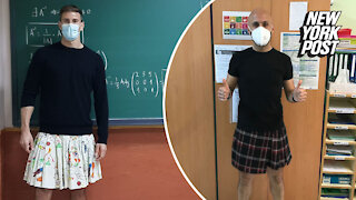 Male teachers wear skirts to school in support of expelled student