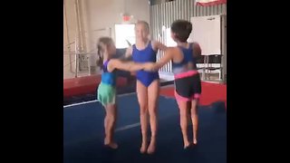 Girls show off their gymnastics triangle dance
