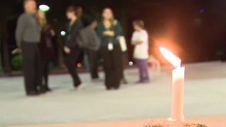 NSC holds vigil for two college alumni killed in mass shooting