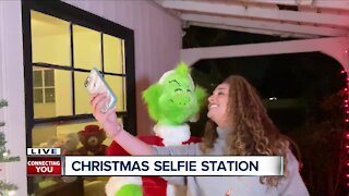 Woman creates Christmas selfie station in yard