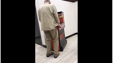 Overly Excited Elderly Man Is Deep Into The Arcade Game
