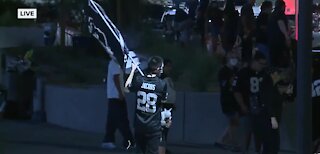 Fans celebrate Raiders' first Las Vegas home game win