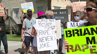 Protesters gather outside Brian Mast's office, call for his resignation