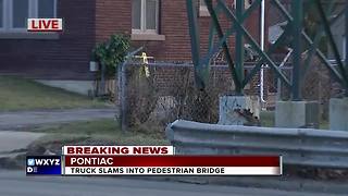 Truck slams into Pontiac pedestrian bridge
