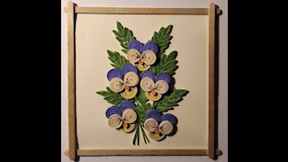 How to make pansies from paper strips by quilling