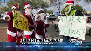 Santas on strike outside local Walmart