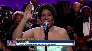 Aretha Franklin lies in gold-plated casket