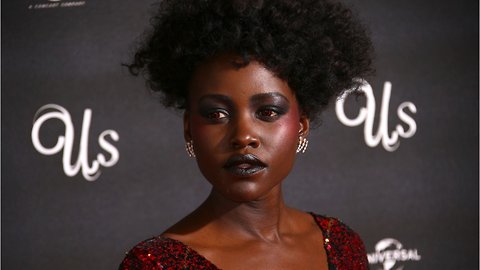 Lupita Nyong'o Sports Red Contacts For 'Us' Premiere