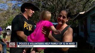 Police and volunteers help needy family of 12 living in small rundown home