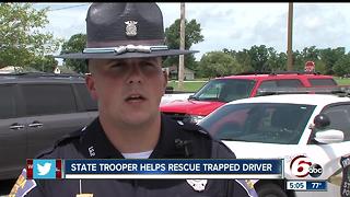 ISP Trooper saves trapped driver from rushing water