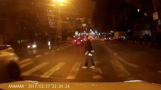 Driver receives instant karma after nearly hitting pedestrian