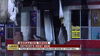 Police at scene of smash-and-grab turned building fire in Detroit strip mall