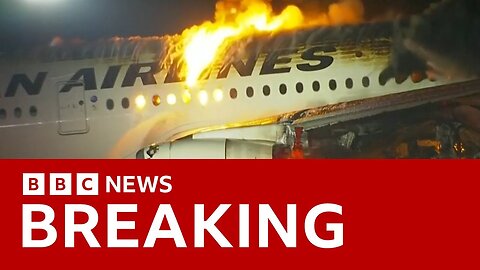 Japan Airlines plane in flames on the runway at Tokyo's Haneda Airport -BBC News