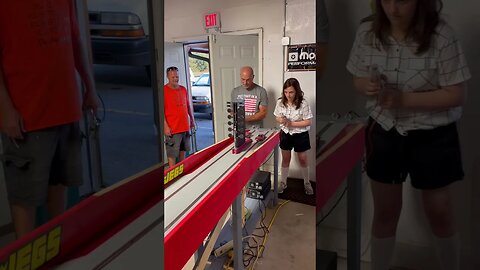 Joe beats his daughter… at slot car drags, that is.