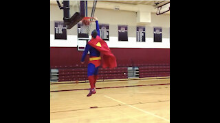 Superman Dunks A Basketball