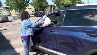 Milwaukee church, community groups give away essential items to help in pandemic