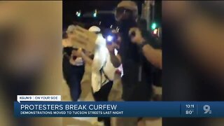 Protesters break curfew and take to the streets