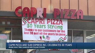 Capri Pizza and Sub Express in Glen Burnie says "We're Open Baltimore!"