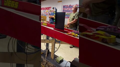 Father and Son Square Off at the Slot Car Drags. Who wins?
