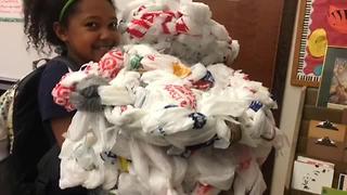 Students recycle plastic bags to make mats for the homeless