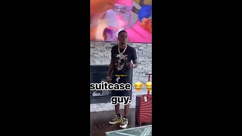 Boosie showing off new suitcase 😂😂