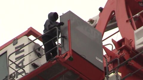 Protester Climbs Tower Crane -East London
