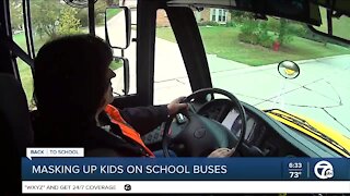 Ali Hoxie talks to Walled Lake Superintendent about masking up on the school bus