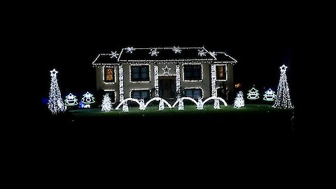 Fun Christmas song set to epic home light show