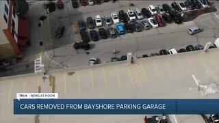 Trapped cars being removed from Bayshore Mall's partially collapsed garage