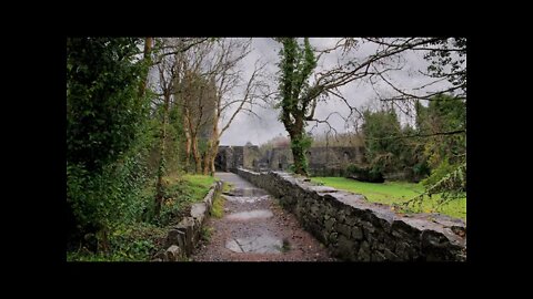 Rainfall on a gravel path by Aughnanure Castle, Ireland.