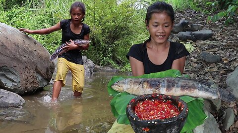 For jungle survival, catch and cook a large fish with pepper sauce.