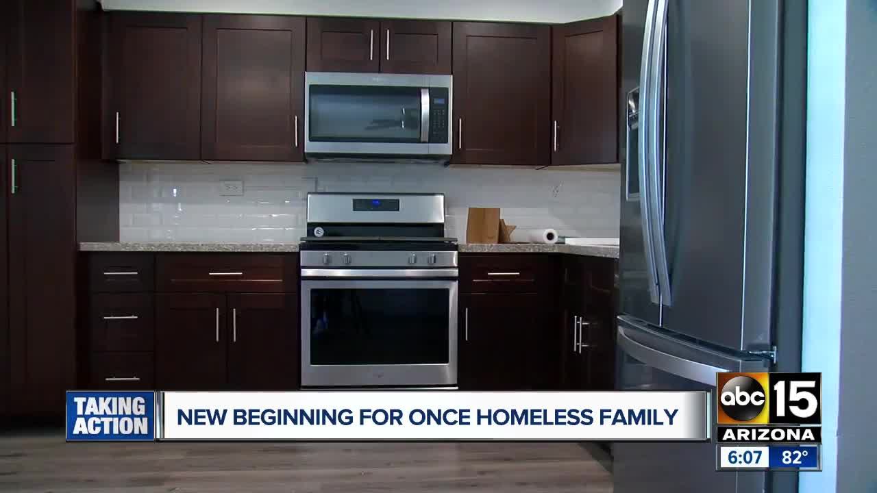 Valley homeless family gets keys to new apartment