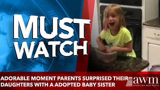 Adorable moment parents surprised their daughters with a newly adopted baby sister