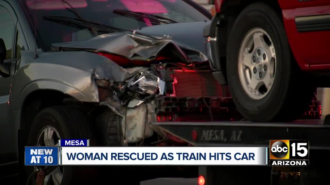 Woman rescued as train hits car in Mesa