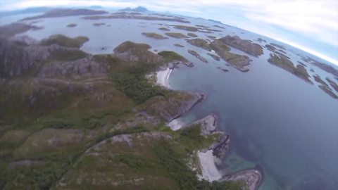 BASE jump POV over stunning Norwegian landscape