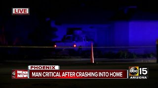 Man seriously hurt after crashing into Phoenix home