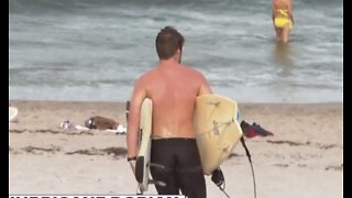 Surfers make the most of Dorian's waves