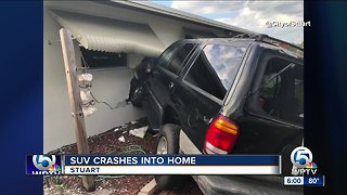 Car crashes into SUV, launching it into a house in Stuart