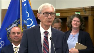 Gov. Evers signs new state budgets, massive tax cuts