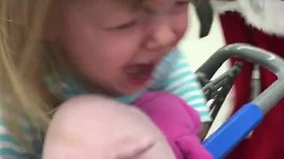 Baby Girl Gets Terrified Of Mechanical Dancing Santa