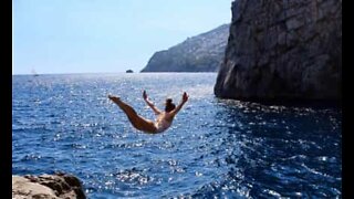 Nail-biting high cliff diving