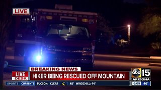 Hiker being rescued off mountain