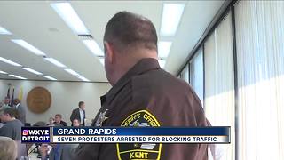 7 protesters arrested for blocking traffic in Grand Rapids