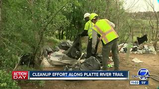 Crews clean up homeless camps along banks of S. Platte River in Denver