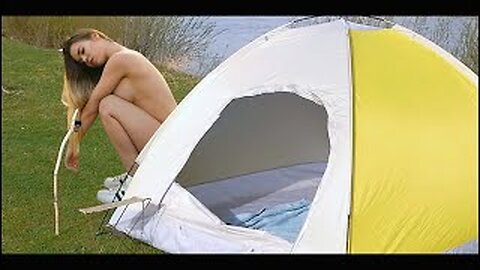 Solo camping by the river, Beautiful girl makes a shelter, lights a fireplace ASMR